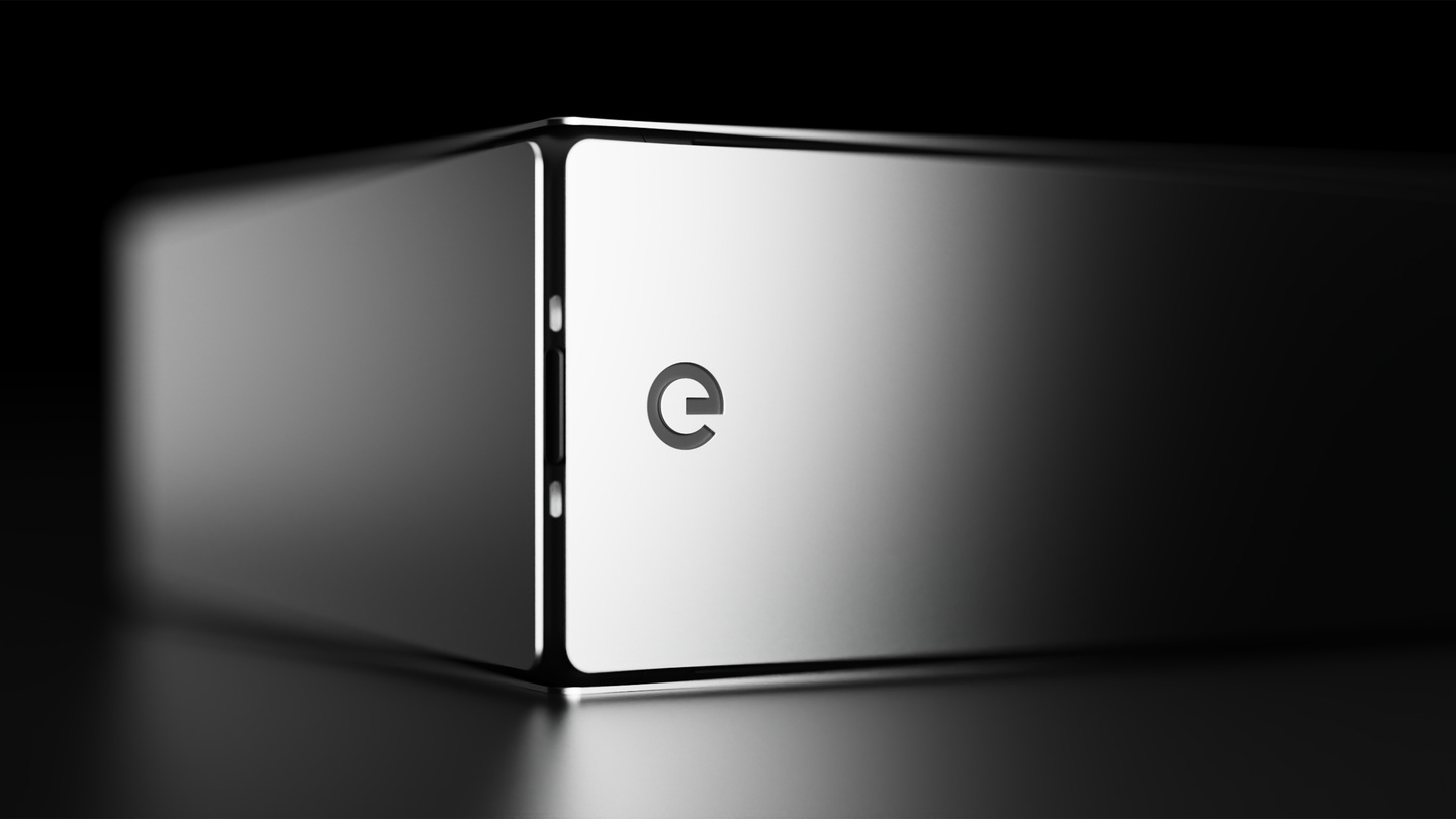 Close-up studio render of metallic hardware enclosure corner with Edge icon detail