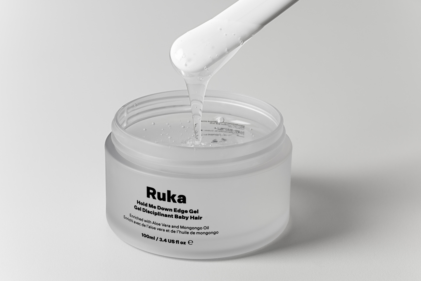 Transparent base container component resting on a white background