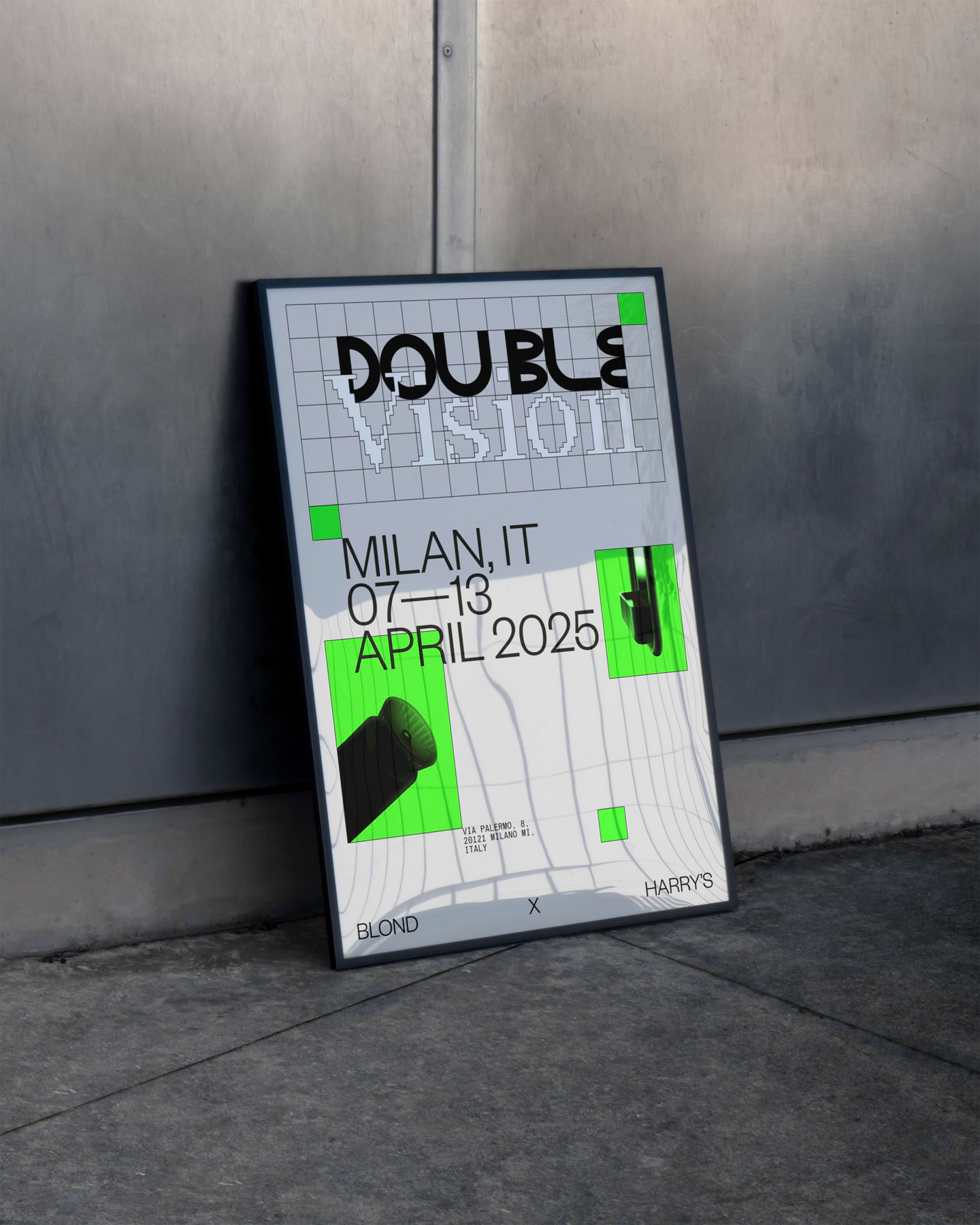 Double Vision event poster resting against a rough concrete wall