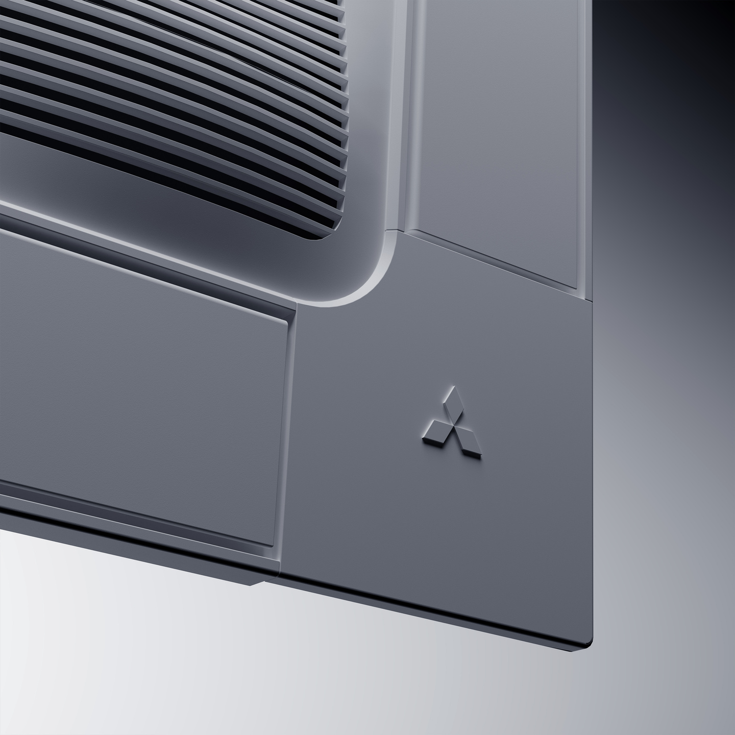 Corner detail of a grey air conditioning cassette showing the Mitsubishi three-diamond logo