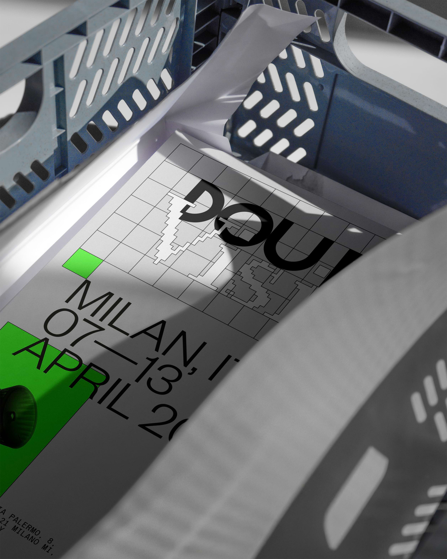 Detail shot of Double Vision event poster in a grey crate