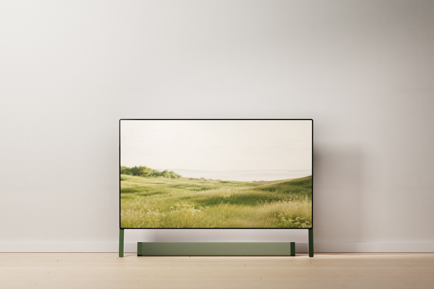 Television displaying a landscape scene in a bright room.
