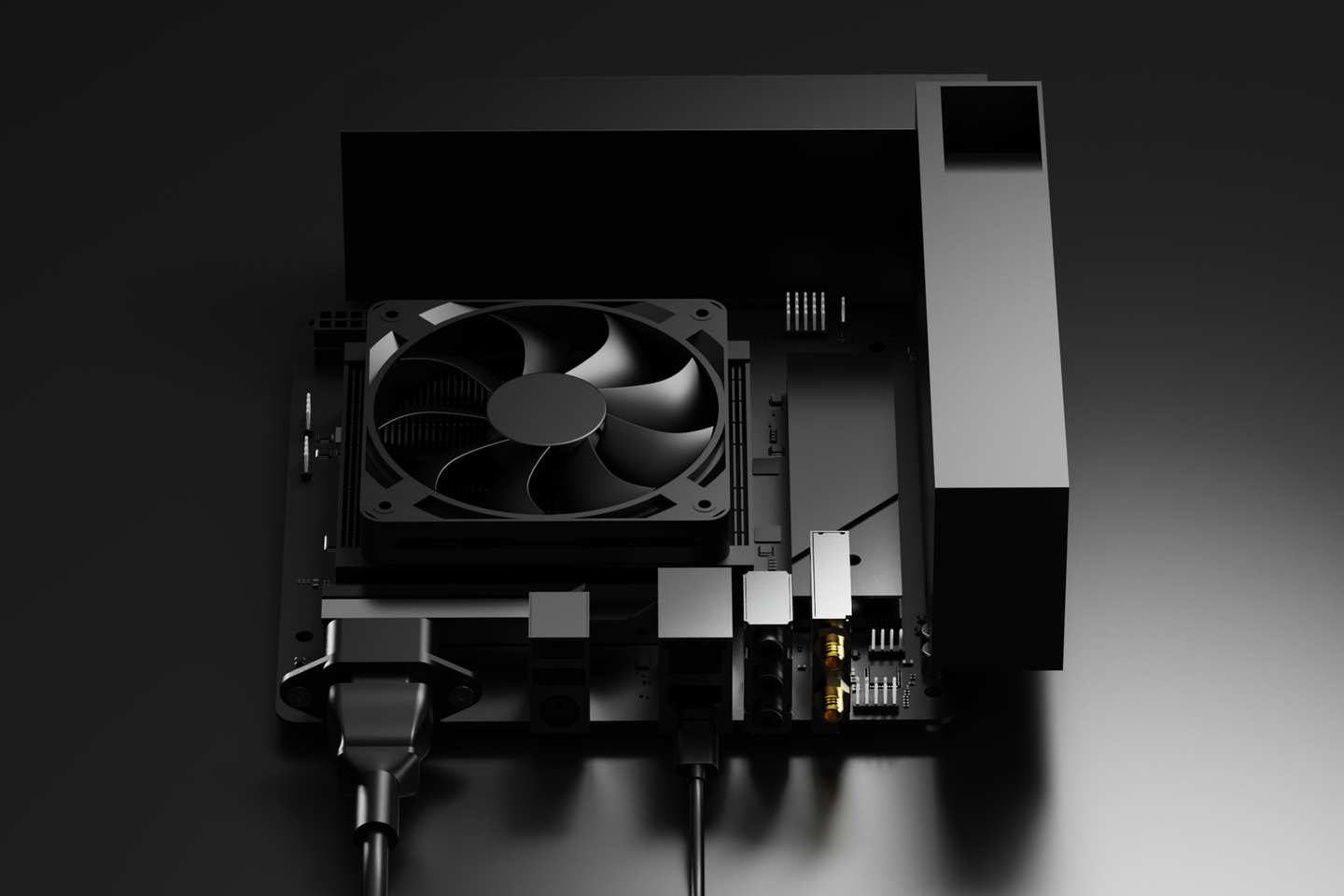 Printed circuit board assembly with cooling fan module on plain dark background