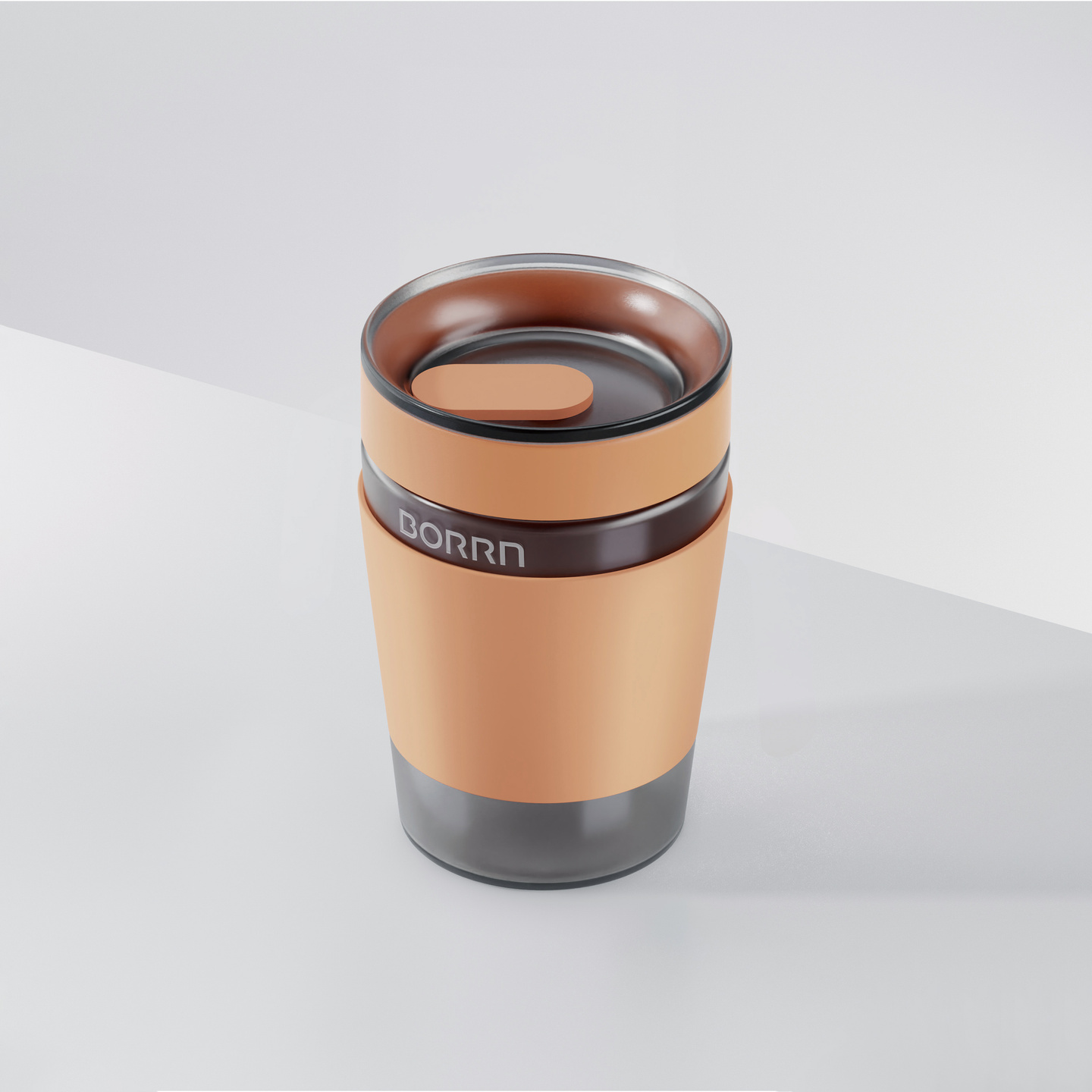 Amber-tinted PPSU baby bottle with dark cap standing against a light grey background