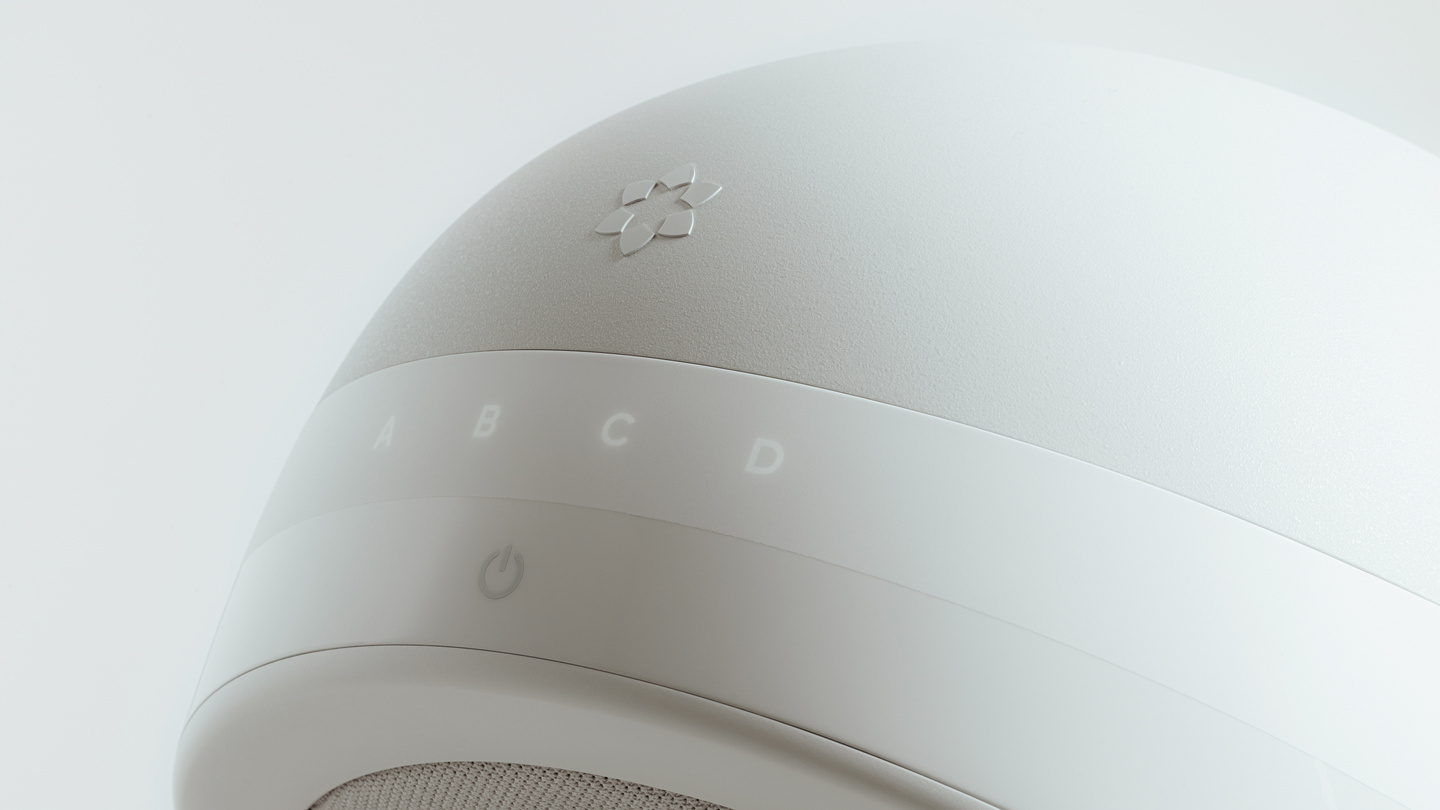 Close-up render of white dome surface showing touch control indicators and icons
