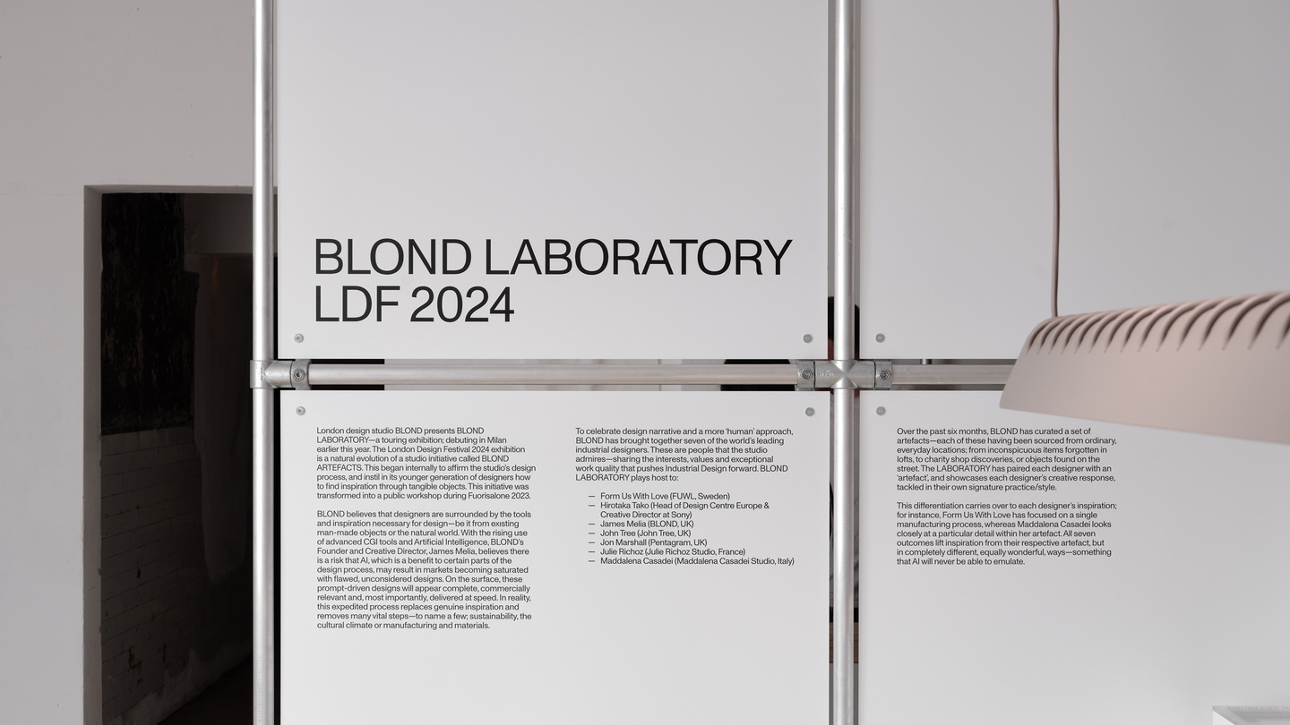 White wall panel installation with graphic typography text