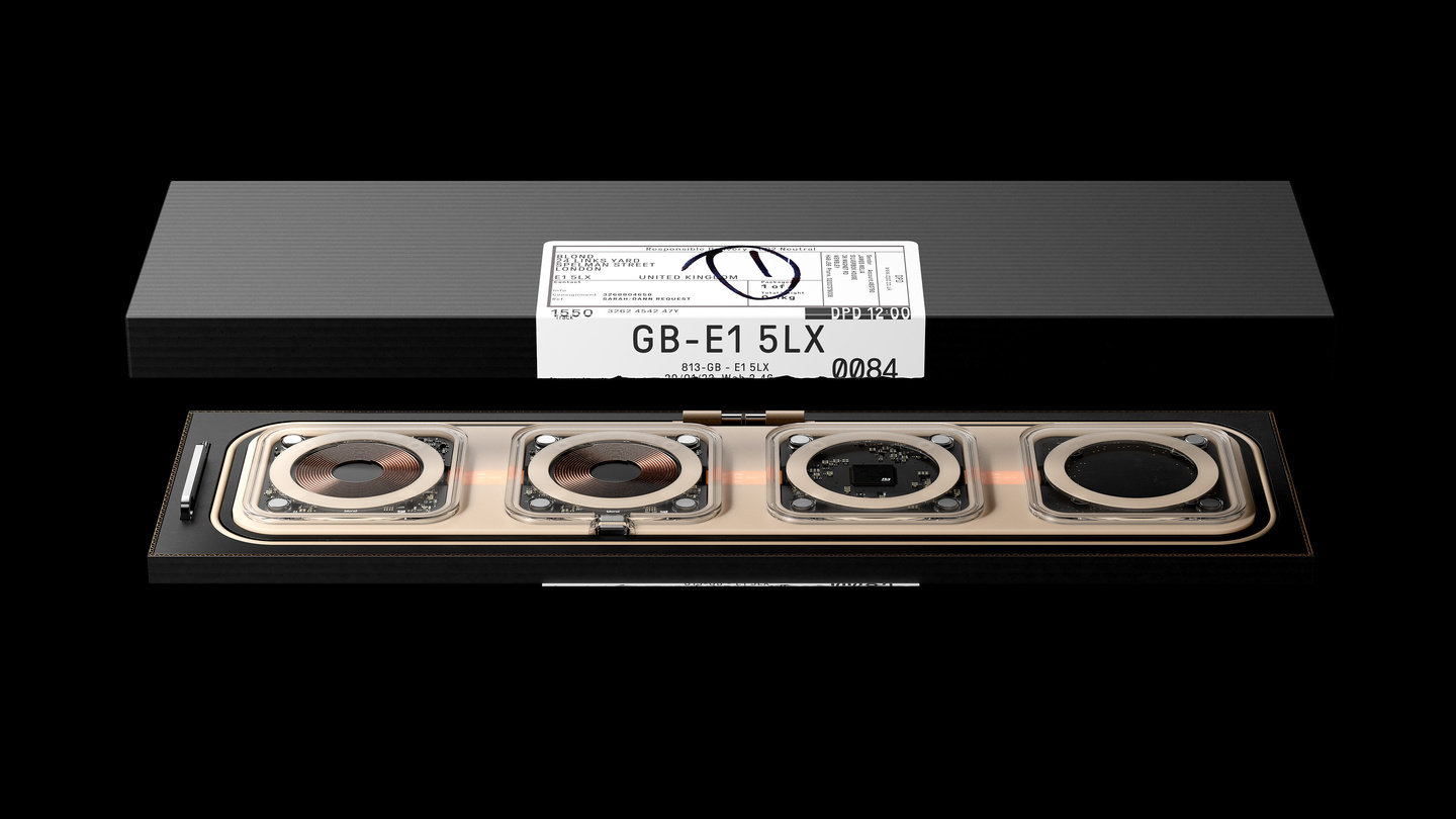 Open black retail packaging box displaying the unfolded wireless charger unit inside.
