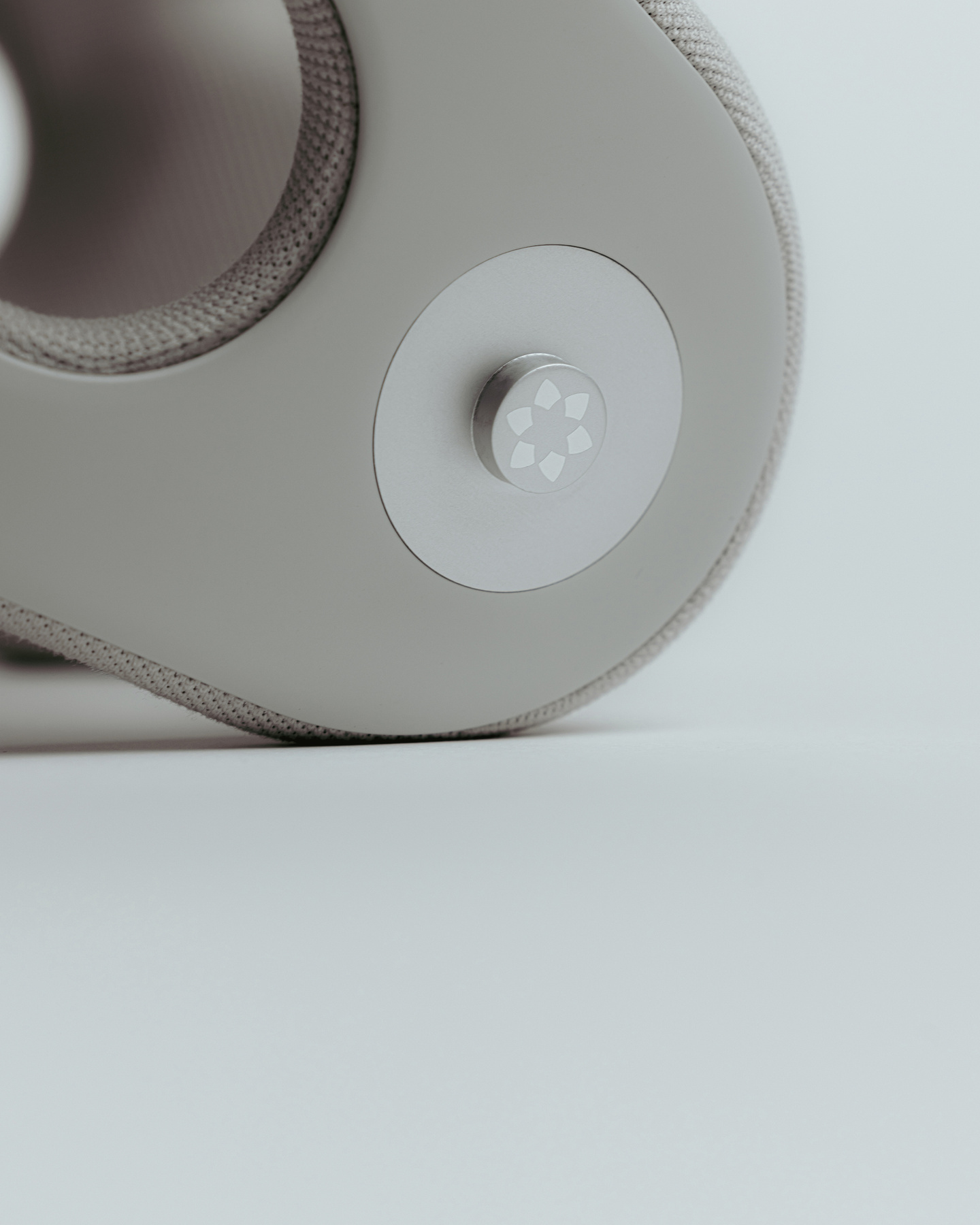 Detailed view of circular dial mechanism on the side of a wearable device