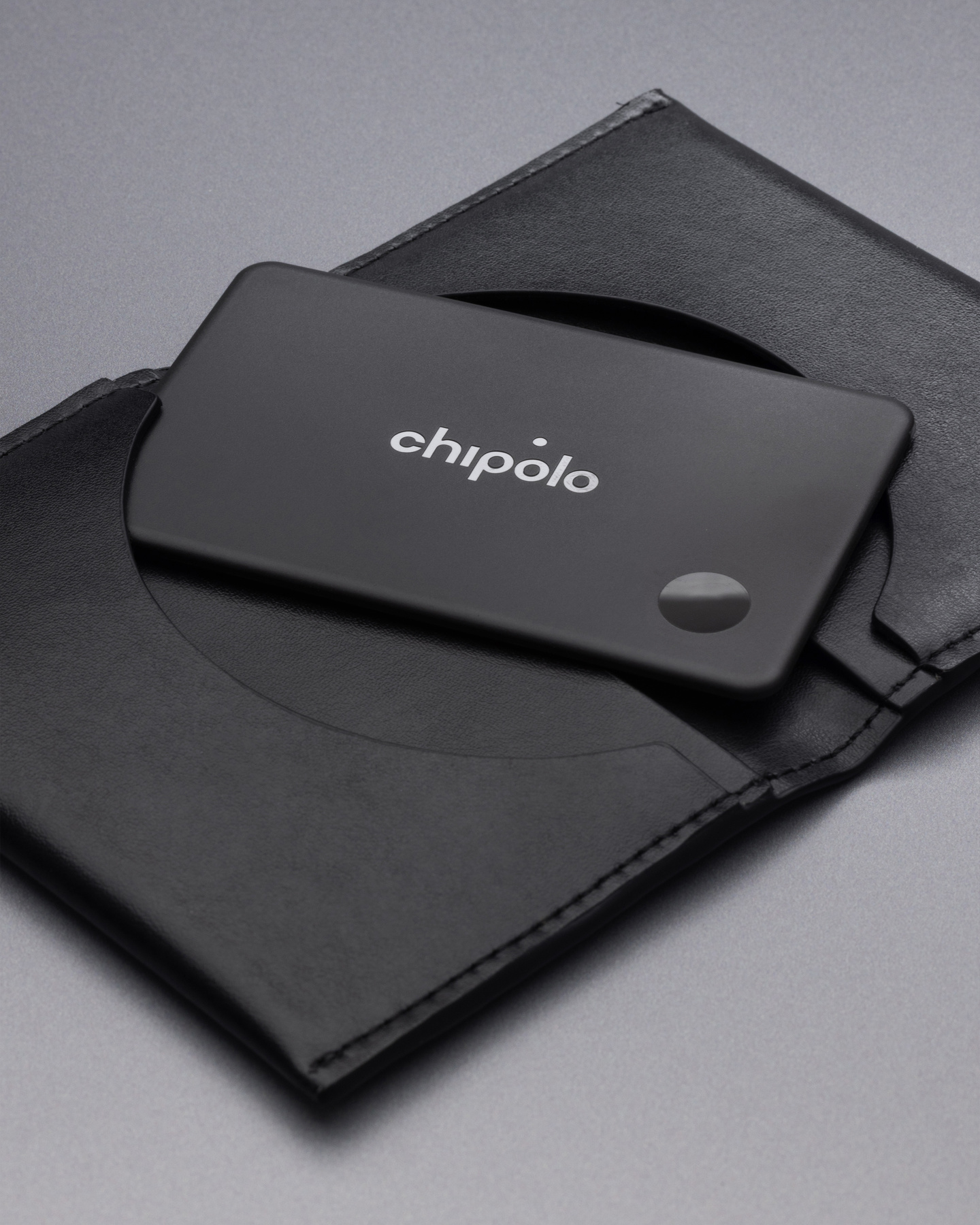 Black leather case for Chipolo card tracker.