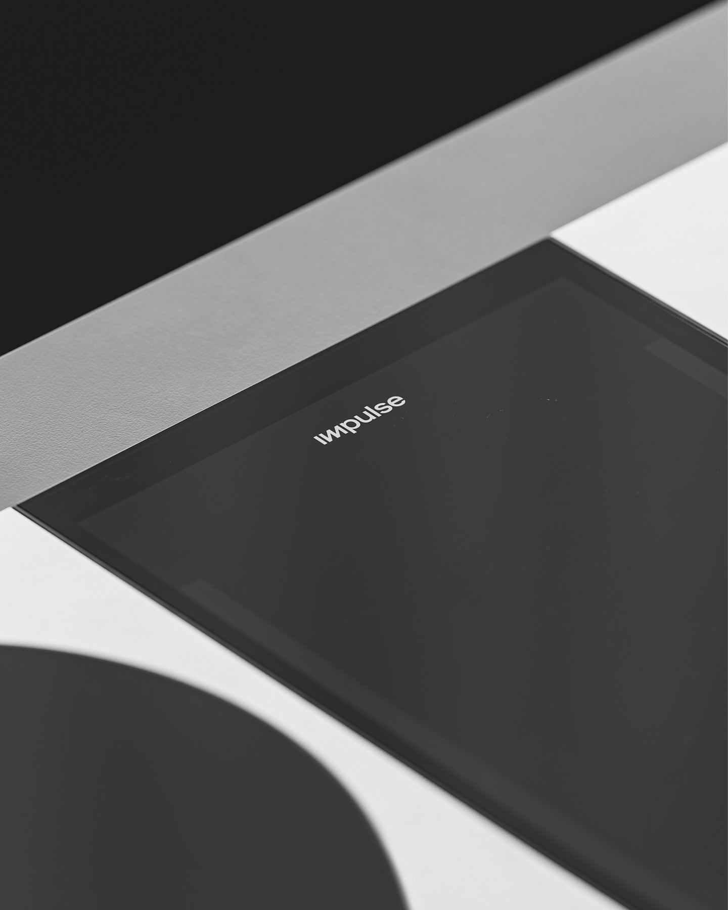 Detailed view of dark metallic corner and surface of a stovetop