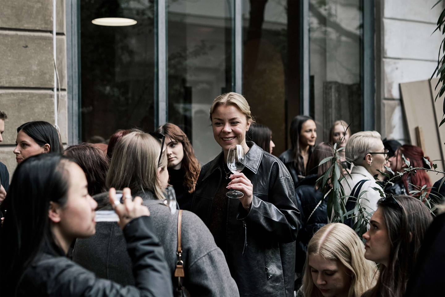 Close-up view of attendees gathered during a Milan Design Week event