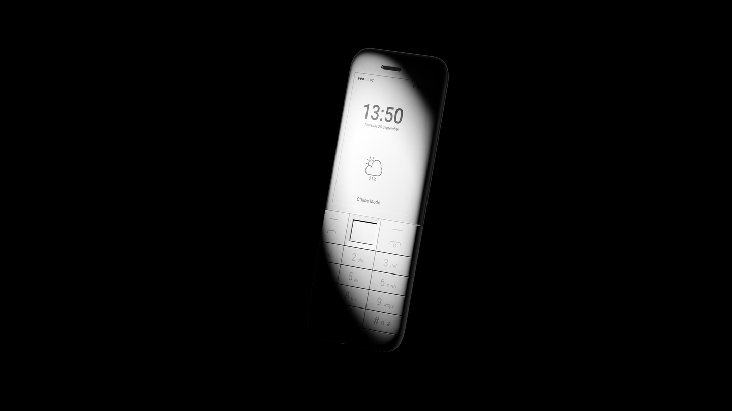 Angled front view of a white phone illuminated against a black background.