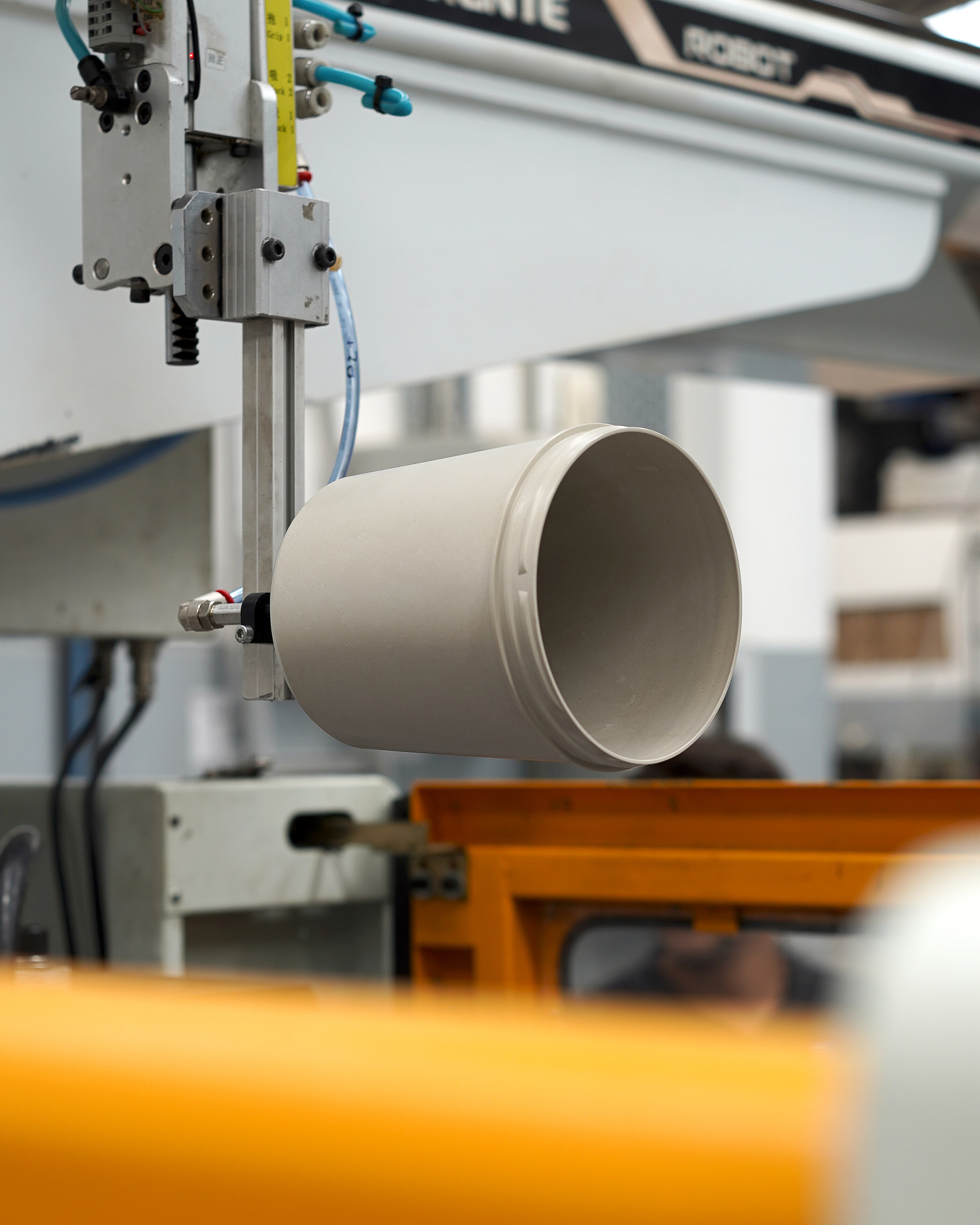 Close-up detail view of mechanical components on a manufacturing line.