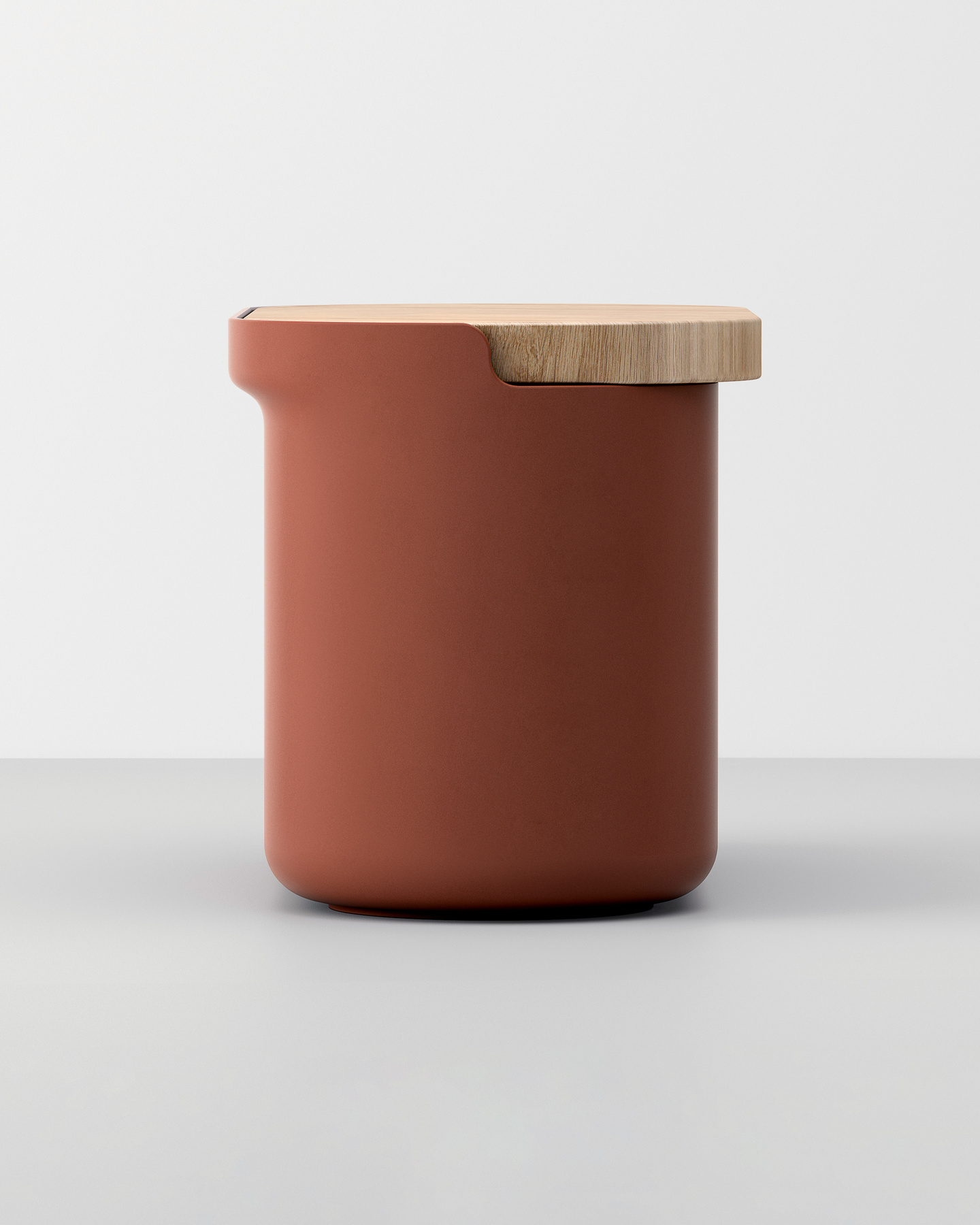 Terracotta storage container with a wooden lid resting on a light grey background