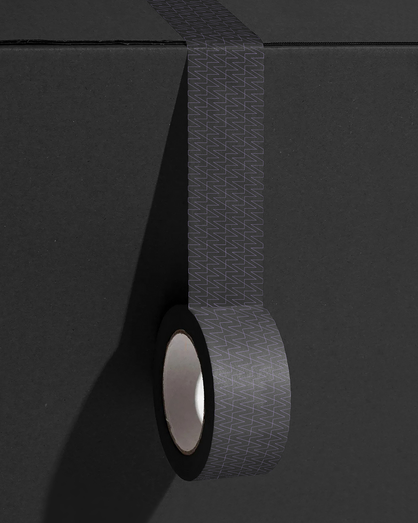 Dark branded packaging tape sealing dark box