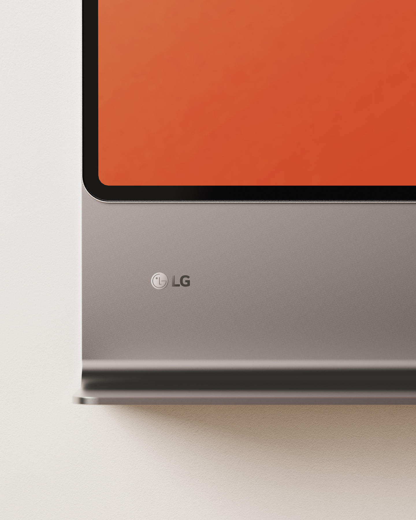 Close-up detail of silver television bezel showing the LG logo.