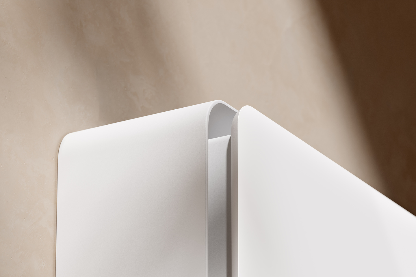 Detailed close-up view of the top corner casing of a white indoor HVAC unit